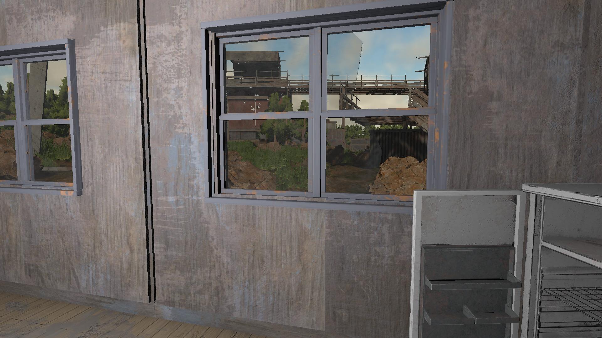 View from inside a settlement house toward the main gate